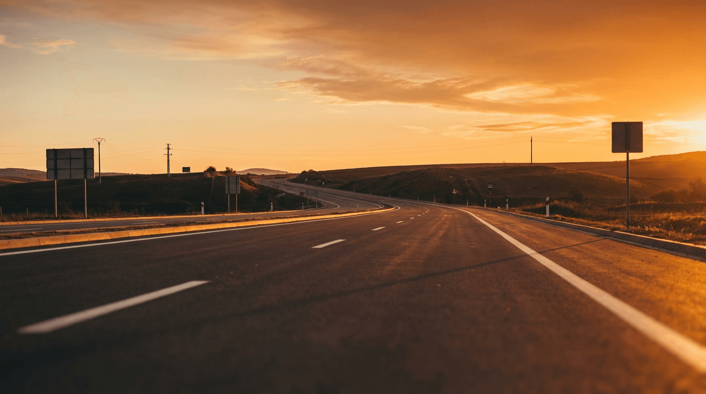 Shuttle driving on a Texas road at sunset